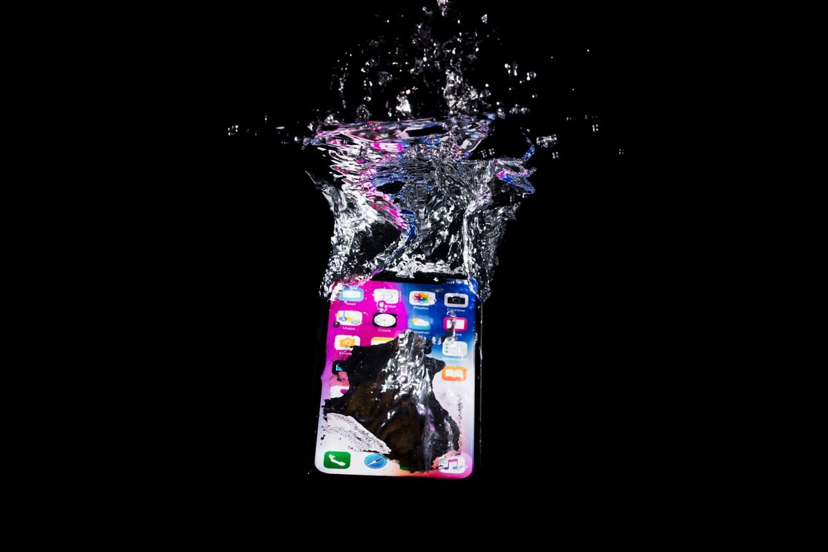 A smartphone submerged under water