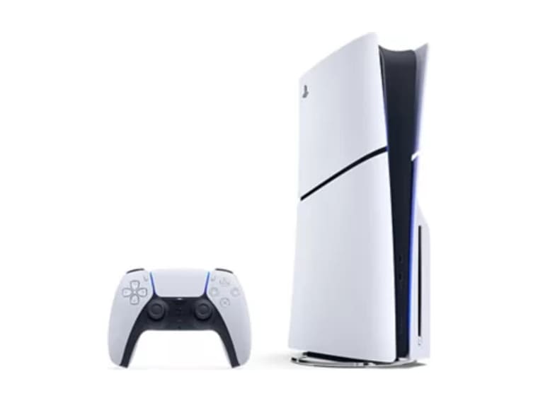 A PlayStation 5 standing upright beside its wireless controller